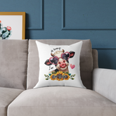 “Funny cow throw pillow on couch with quote ‘Oh honey, I am that heifer’ and heart sunglasses”