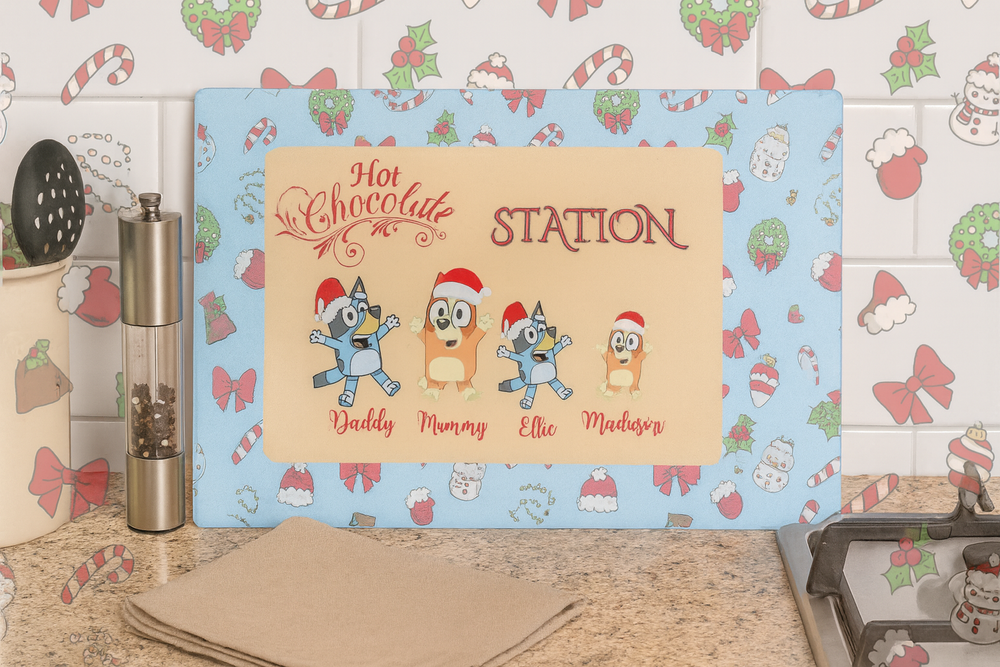 Hot chocolate station sign with cartoon characters on a decorative kitchen wall.