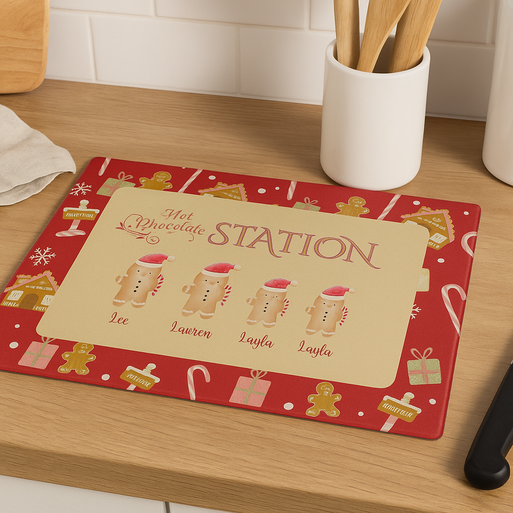 Red placemat with 'Hot Chocolate Station' design on a kitchen counter.