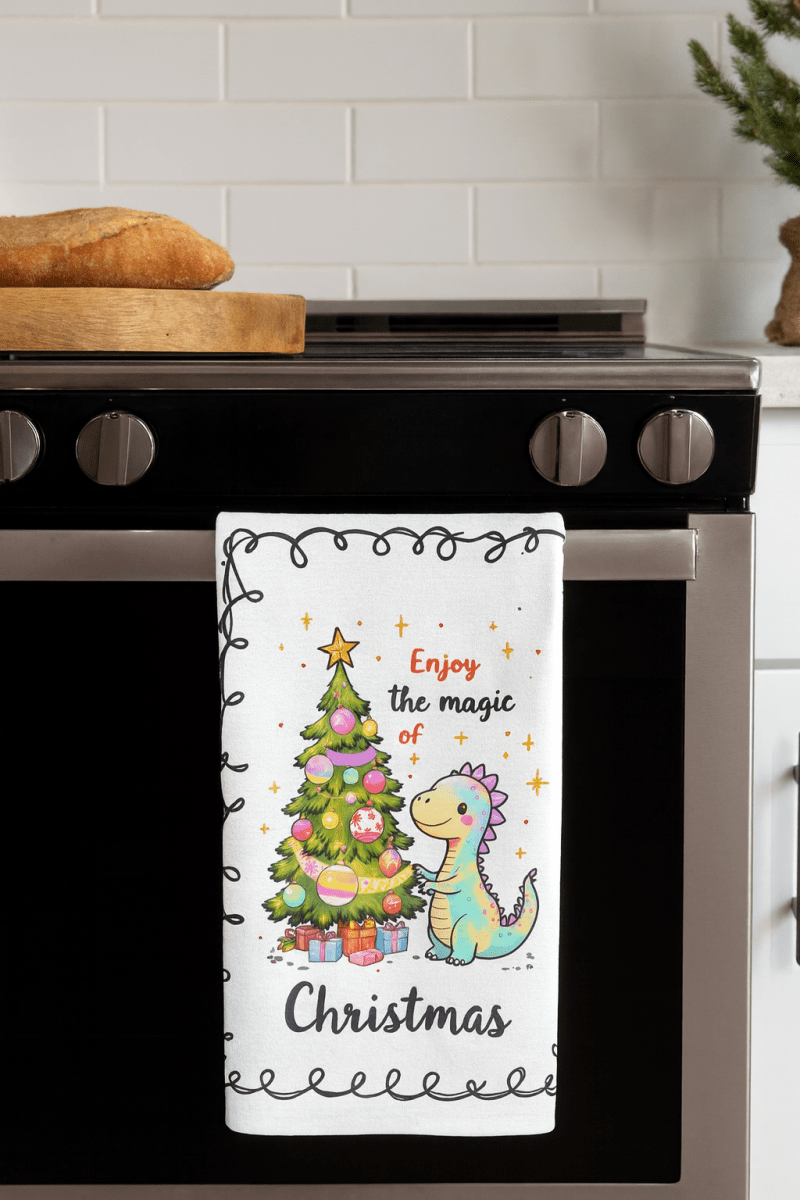 Dinosaur Christmas Towel – “Enjoy the Magic of Christmas” Holiday Kitchen Decor - East Coast Gifts